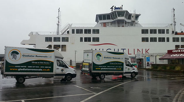 Two Gladiator Removal Vans at the ferry port,
